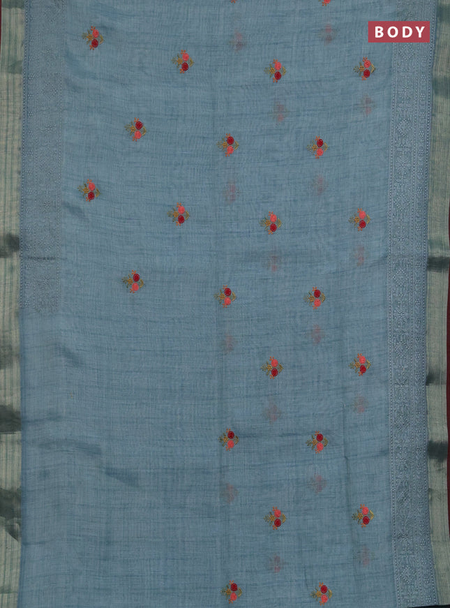 Linen saree pastel blue and maroon with embroidery buttas and embroidery pallu & border