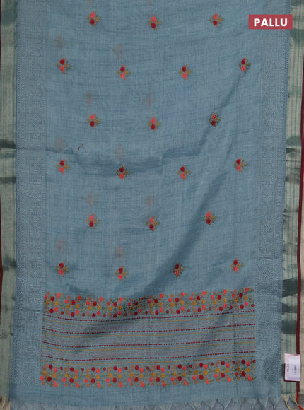 Linen saree pastel blue and maroon with embroidery buttas and embroidery pallu & border