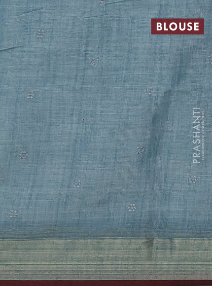 Linen saree pastel blue and maroon with embroidery buttas and embroidery pallu & border