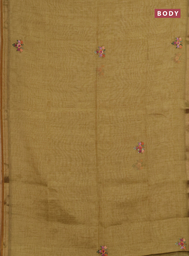 Linen saree mustard shade with embroidery buttas and embroidery pallu