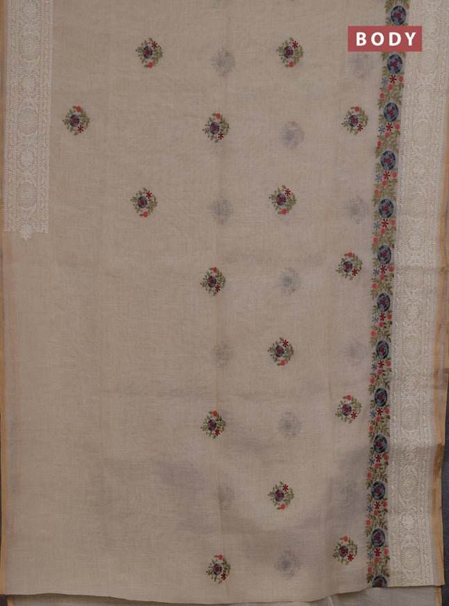 Linen saree beige with embroidery buttas and embroidery border
