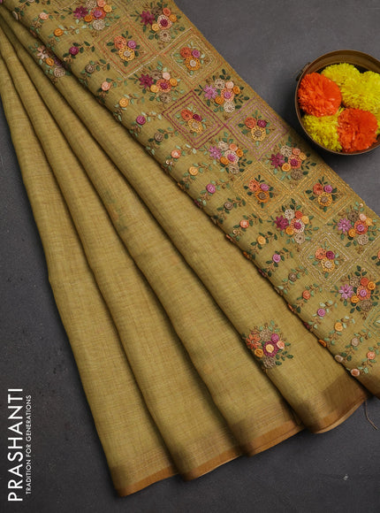 Linen saree mustard shade with embroidery buttas and embroidery pallu