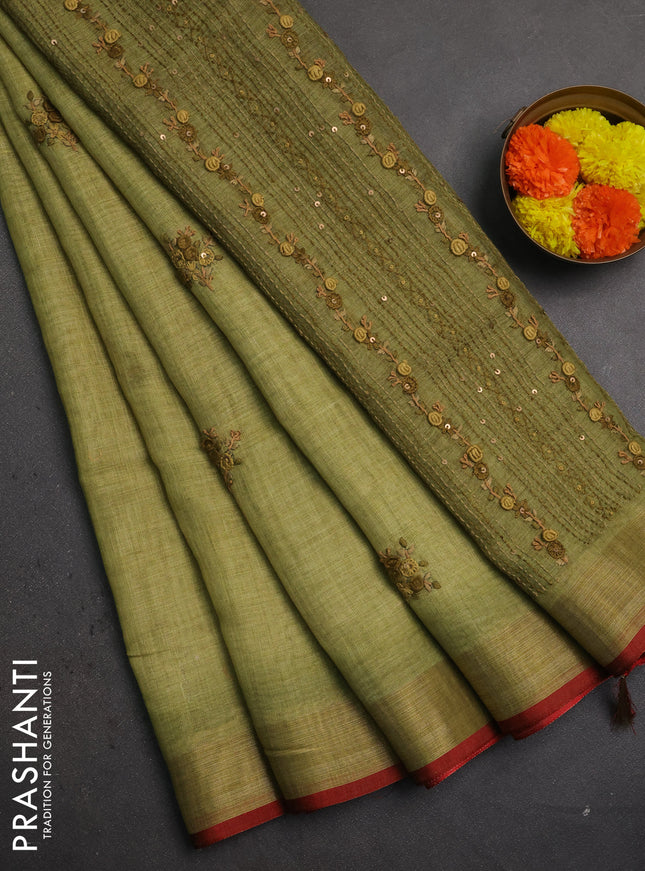 Linen saree mehendi green and maroon with embroidery buttas and embroidery pallu