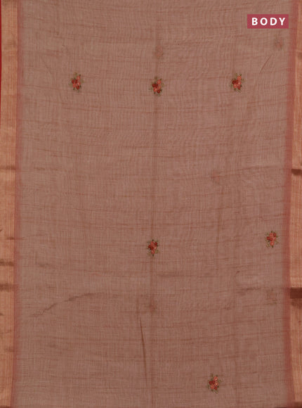 Linen saree dark peach and maroon with embroidery buttas and embroidery pallu