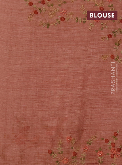 Linen saree dark peach and maroon with embroidery buttas and embroidery pallu