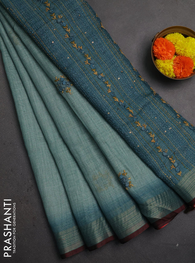 Linen saree teal green with embroidery buttas and embroidery pallu