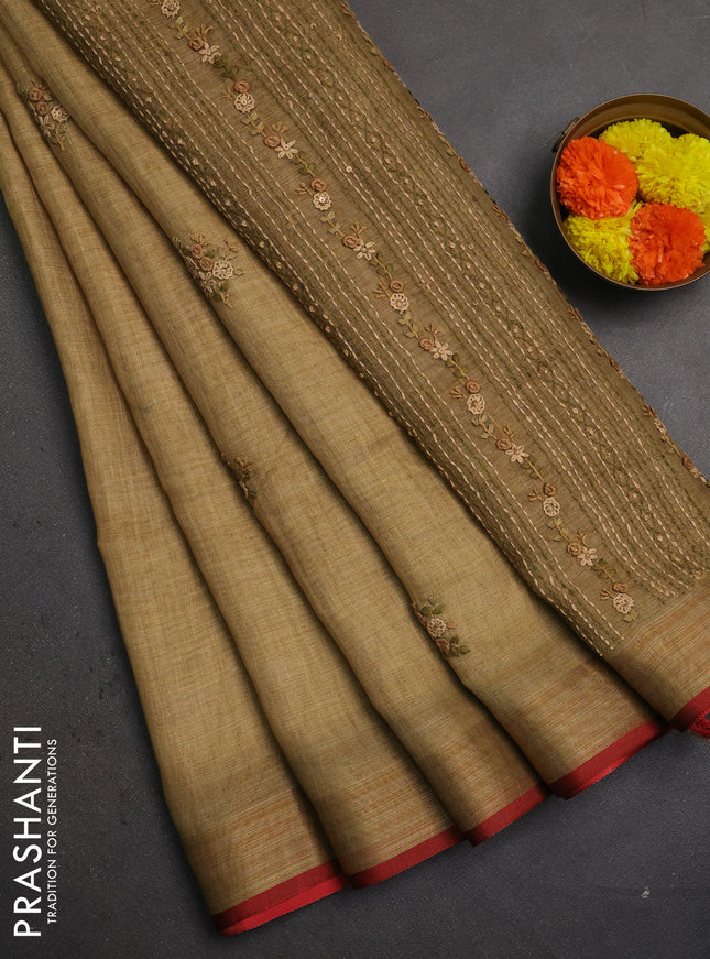 Linen saree dark mustard and maroon with embroidery buttas and embroidery pallu