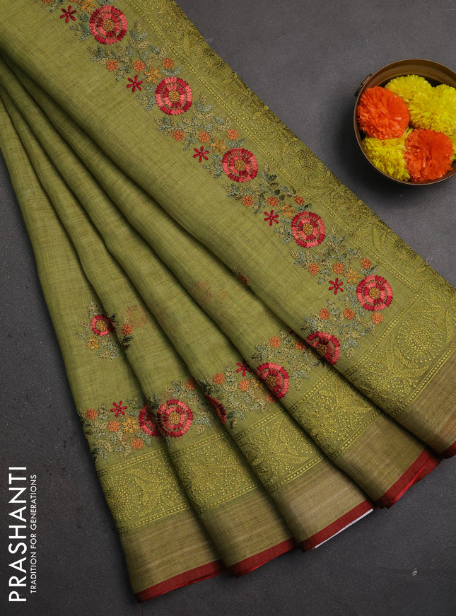 Linen saree light green and maroon with embroidery buttas and embroidery pallu & border
