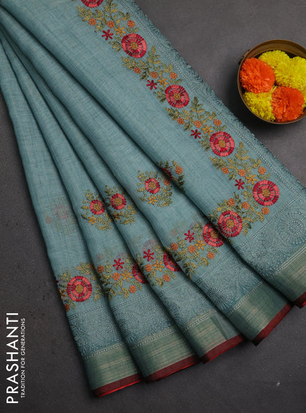 Linen saree teal blue and maroon with embroidery buttas and embroidery pallu & border
