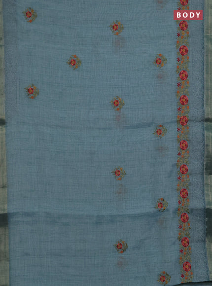 Linen saree teal blue and maroon with embroidery buttas and embroidery pallu & border