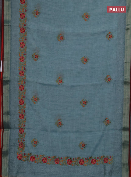 Linen saree teal blue and maroon with embroidery buttas and embroidery pallu & border