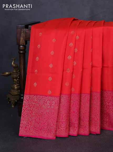 Kanchipuram soft silk saree reddish orange and pink with allover zari woven buttas and long zari woven border