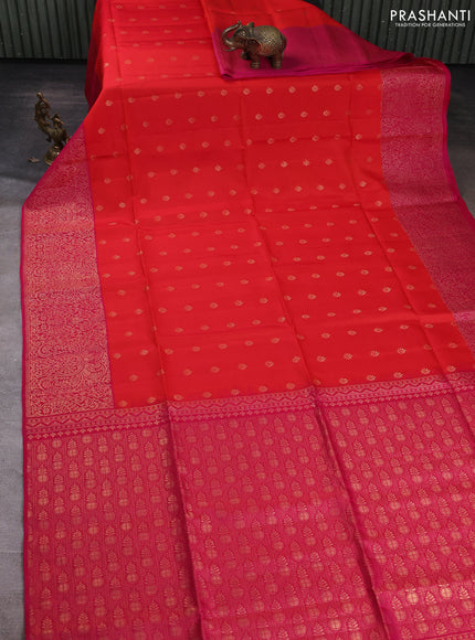 Kanchipuram soft silk saree reddish orange and pink with allover zari woven buttas and long zari woven border
