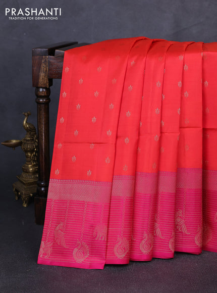Kanchipuram soft silk saree reddish orange and pink with allover zari woven buttas and long zari woven border