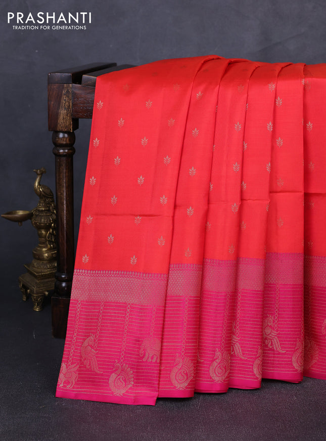 Kanchipuram soft silk saree reddish orange and pink with allover zari woven buttas and long zari woven border