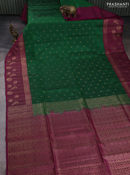 Kanchipuram soft silk saree green and dark magenta pink with allover zari woven buttas and long zari woven border