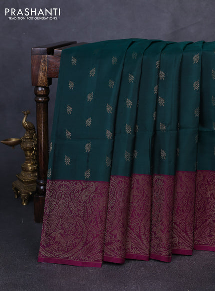 Kanchipuram soft silk saree bottle green and magenta pink with allover zari woven buttas and long zari woven border