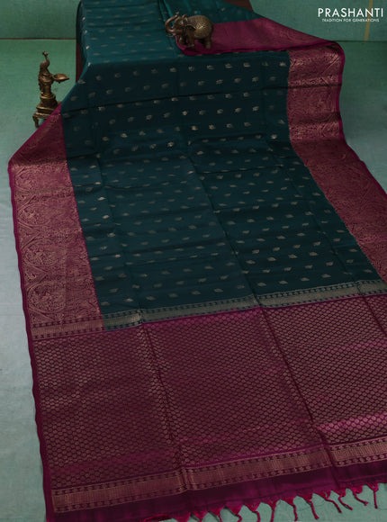 Kanchipuram soft silk saree bottle green and magenta pink with allover zari woven buttas and long zari woven border