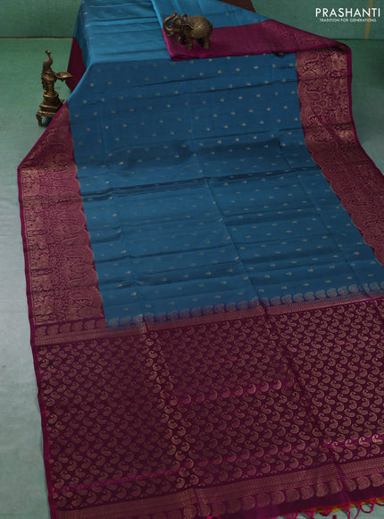 Kanchipuram soft silk saree pastel blue and magenta pink with allover zari woven buttas and long zari woven border