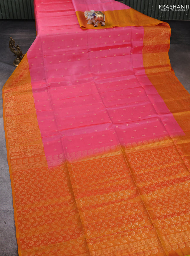 Kanchipuram soft silk saree light pink and mustard yellow with allover zari woven buttas and long zari woven border