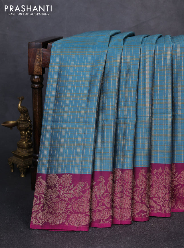 Kanchipuram soft silk saree pastel blue and dark magenta pink with allover zari woven checks and zari woven border