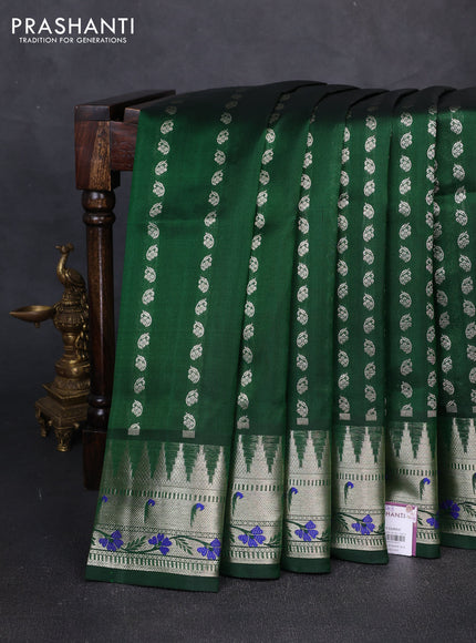 Venkatagiri silk saree bottle green with allover silver zari woven buttas and zari woven muniya butta border