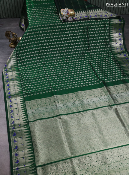 Venkatagiri silk saree bottle green with allover silver zari woven buttas and zari woven muniya butta border