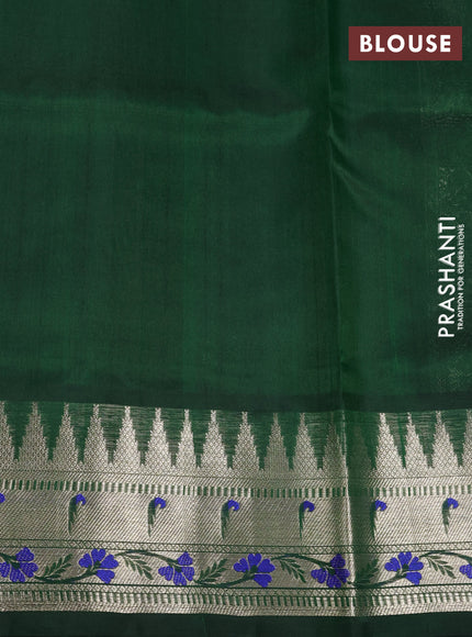 Venkatagiri silk saree bottle green with allover silver zari woven buttas and zari woven muniya butta border