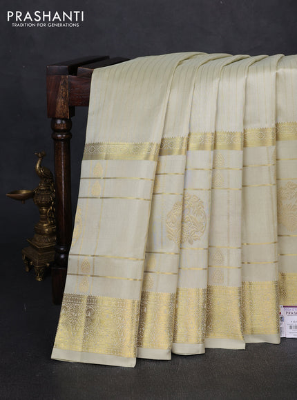 Venkatagiri silk saree cream with allover zari weaves and long zari woven border