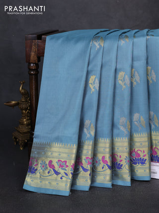 Venkatagiri silk saree pastel blue with allover zari woven buttas and zari woven muniya butta border