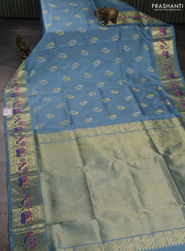 Venkatagiri silk saree pastel blue with allover zari woven buttas and zari woven muniya butta border