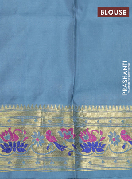 Venkatagiri silk saree pastel blue with allover zari woven buttas and zari woven muniya butta border