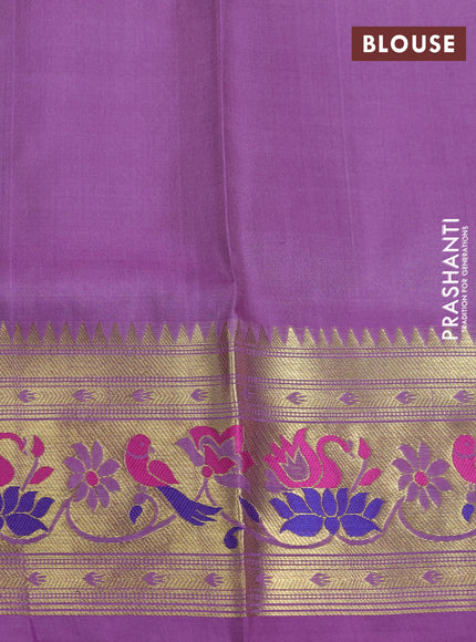 Venkatagiri silk saree lavender with allover zari woven buttas and zari woven muniya butta border