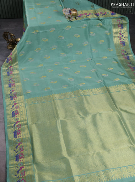 Venkatagiri silk saree pastel green with allover zari woven buttas and zari woven muniya butta border