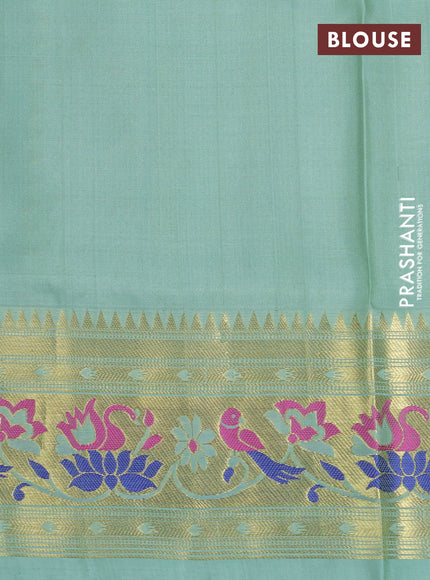 Venkatagiri silk saree pastel green with allover zari woven buttas and zari woven muniya butta border