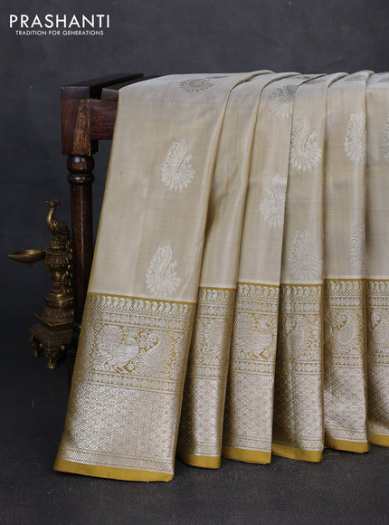 Venkatagiri silk saree elaichi green and mehendi green with allover zari woven buttas and long zari woven border