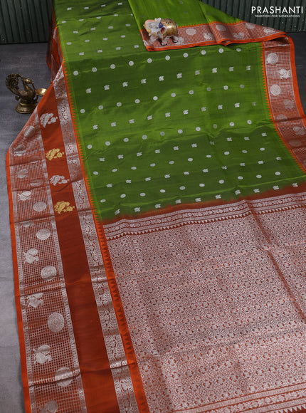 Venkatagiri silk saree mehendi green and orange with allover zari woven buttas and long zari woven border