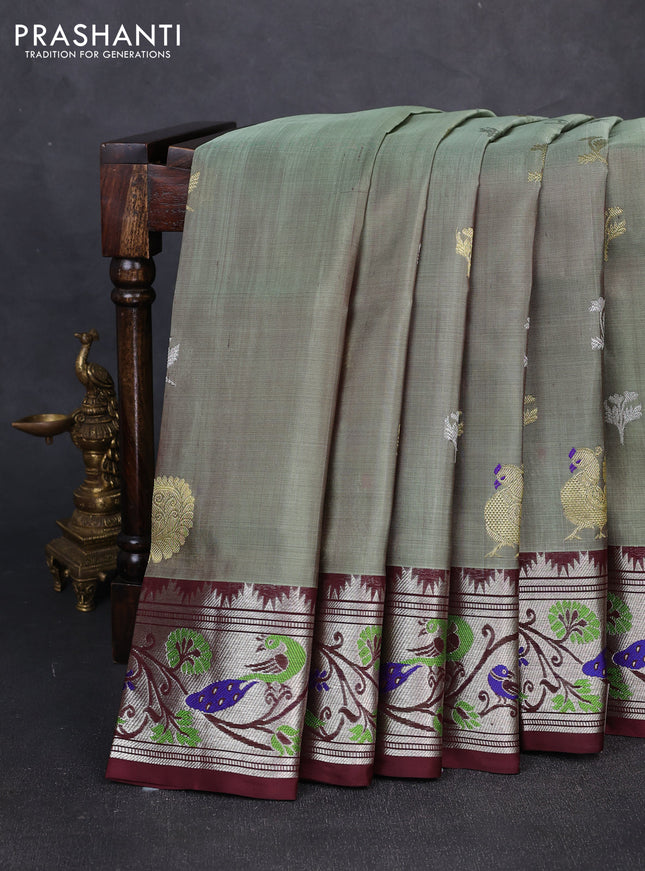 Venkatagiri silk saree pastel green and coffee brown with allover silver & zari woven buttas and peacock design zari woven border