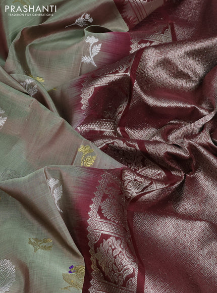Venkatagiri silk saree pastel green and coffee brown with allover silver & zari woven buttas and peacock design zari woven border