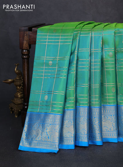 Venkatagiri silk saree dual shade of teal green and cs blue with allover zari checks & buttas and zari woven border
