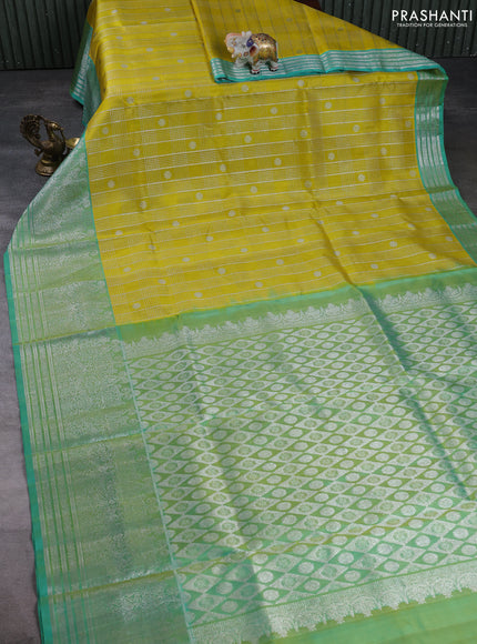 Venkatagiri silk saree yellow and green shade with allover silver zari checks & buttas and long zari woven border