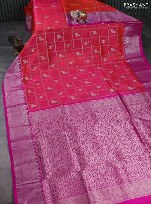 Venkatagiri silk saree dual shade of pinkish orange and pink with allover silver zari checks & buttas and silver zari woven border