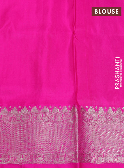 Venkatagiri silk saree dual shade of pinkish orange and pink with allover silver zari checks & buttas and silver zari woven border
