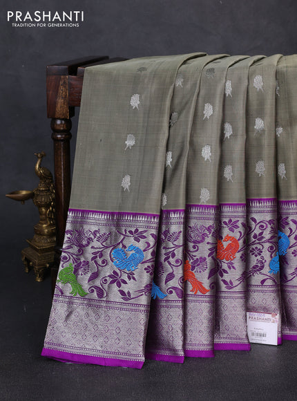 Venkatagiri silk saree pastel green and violet with allover zari woven buttas and long peacock design zari woven border
