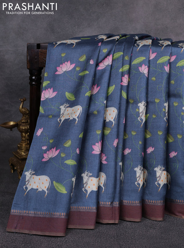 Pure tussar silk saree blue with allover pichwai prints and woven border