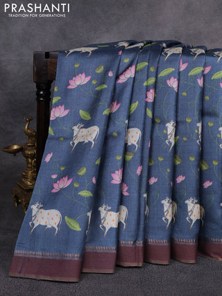 Pure tussar silk saree blue with allover pichwai prints and woven border