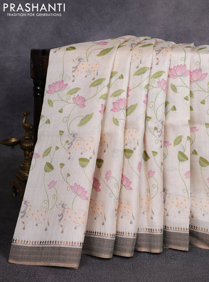 Pure tussar silk saree cream with allover pichwai prints and woven border