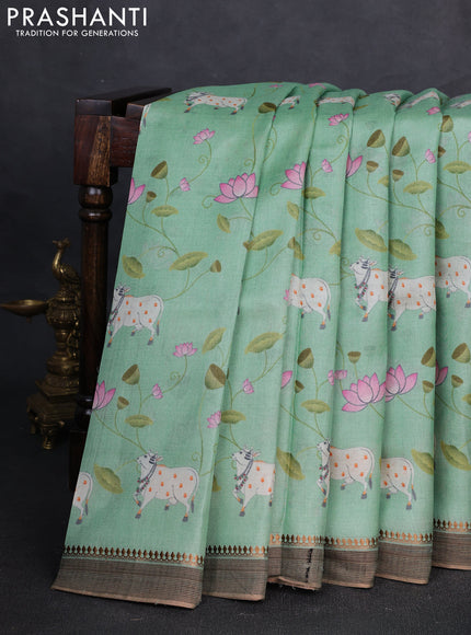 Pure tussar silk saree teal green with allover pichwai prints and woven border