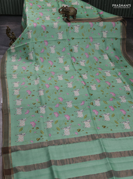 Pure tussar silk saree teal green with allover pichwai prints and woven border