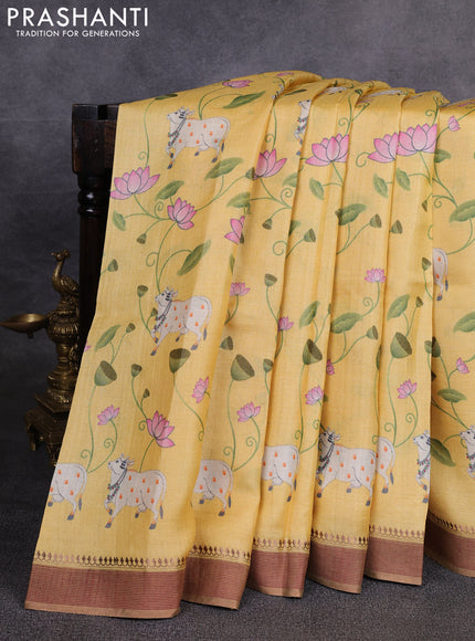 Pure tussar silk saree yellow with allover pichwai prints and woven border